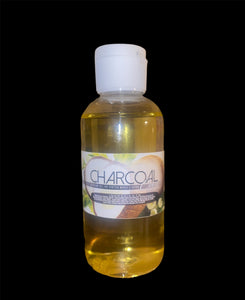 Charcoal coco skincare oil for stretch Marks and scars